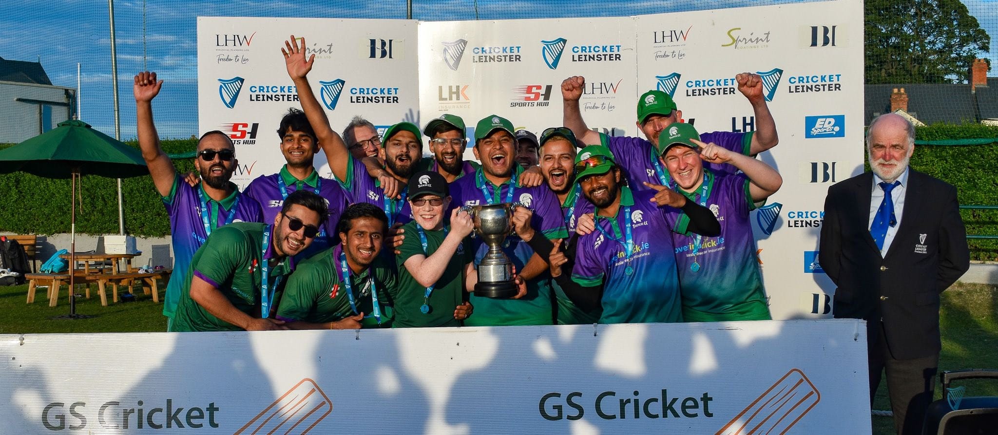 Image of 3rds team celebrating after winning a trophy