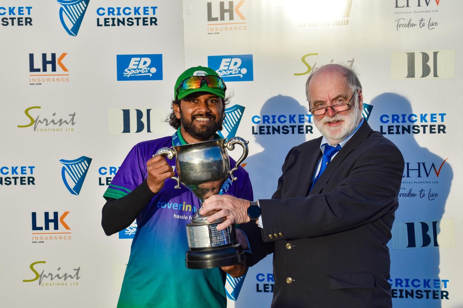 Image of 4ths captain recieving a trophy